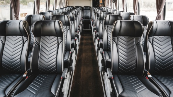 56 passenger charter bus rental